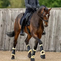 LeMieux - Guêtres de dressage Motionflex avec fourrure noir/ naturel